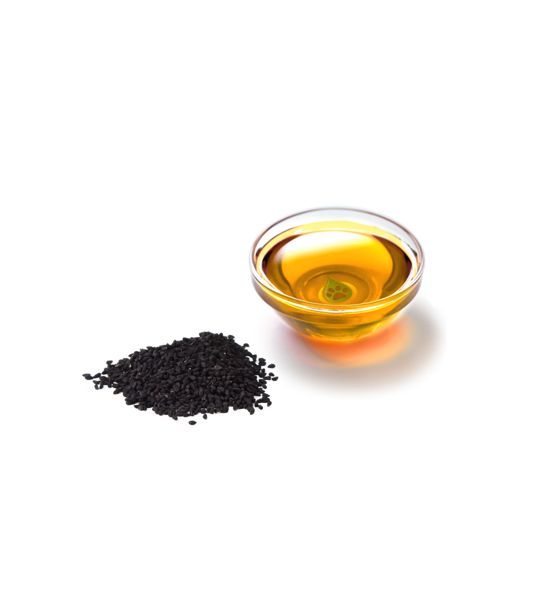 Schwarzkümmelsamen und Schwarzkümmelöl in einer Schale