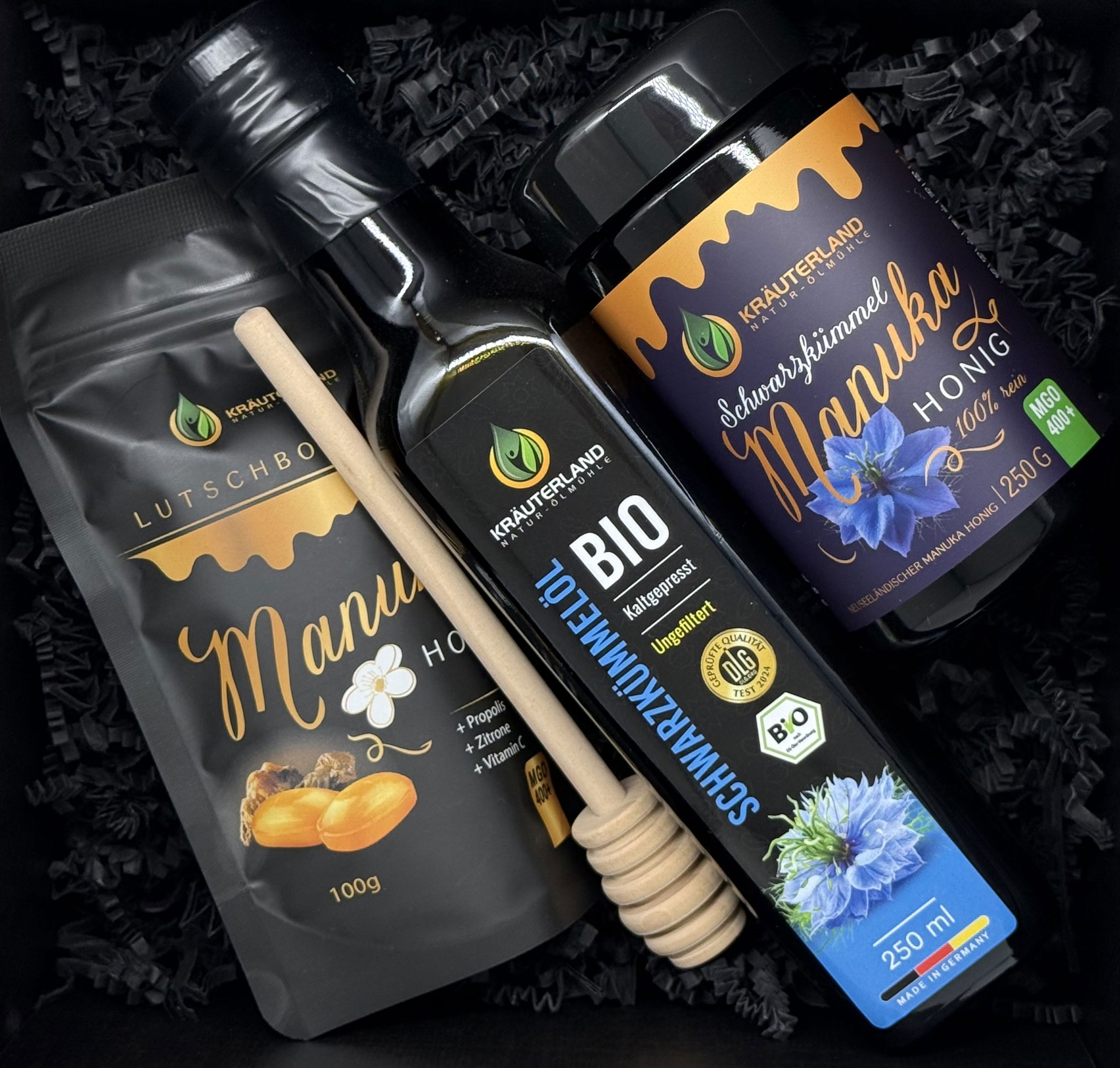Geschenkset Inhalt mit Manuka-Schwarzkümmel Honig MGO 400 Schwarzkümmelöl Bio und Manuka Lutschbonbons von Kräuterland